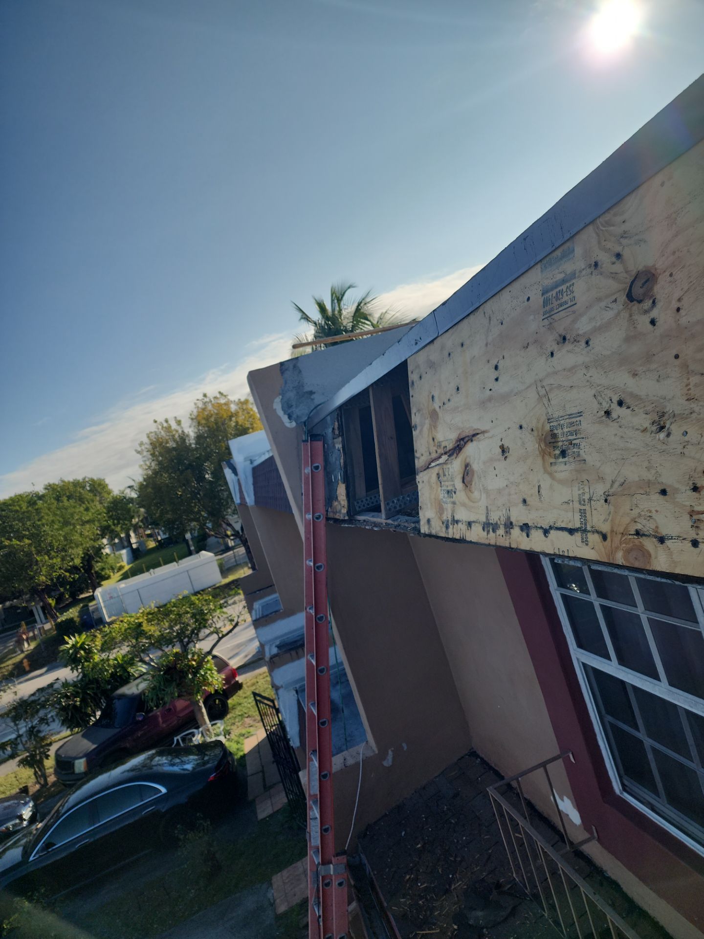 Mansard shingles and flat by Windows Roofs Plus Inc.
