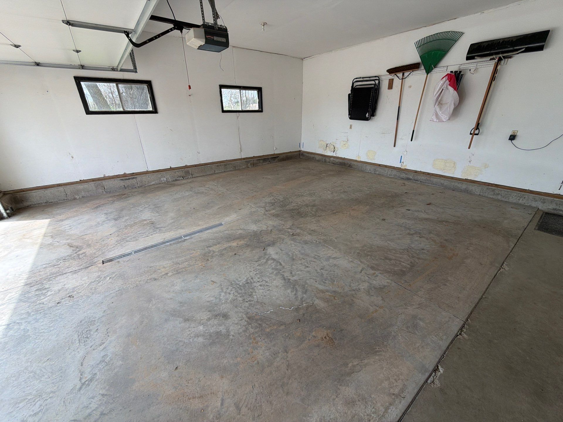 Hartford Residential Garage Floor Transformation With Decorative Chip Coating by Select Painting, Coatings & Garage Cabinets