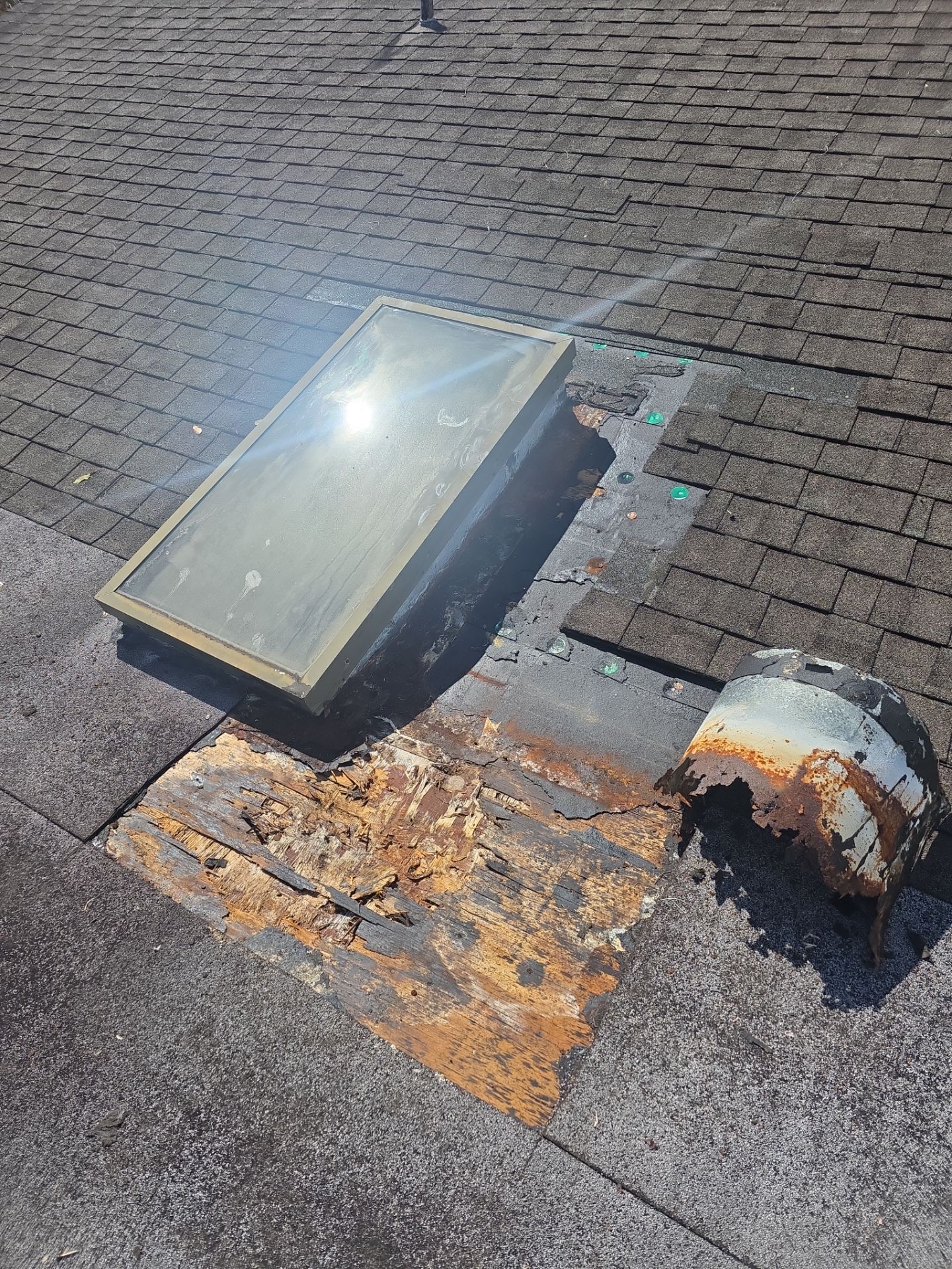 REPLACE NON APPROVED SKYLIGHT ALONG WITH CLOGED GUTTER by Morton Roofing, Inc.