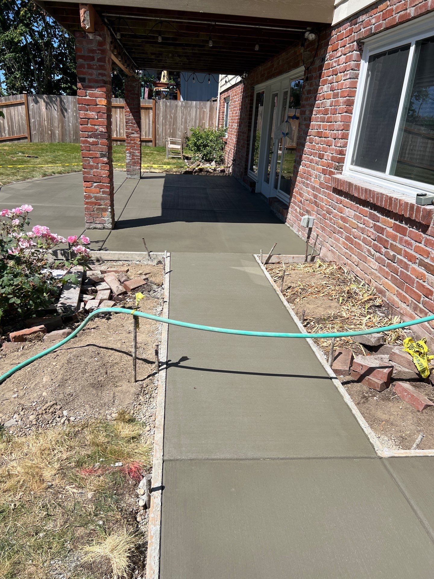 Susan | Concrete Patio by Jireh Asphalt & Concrete Inc 