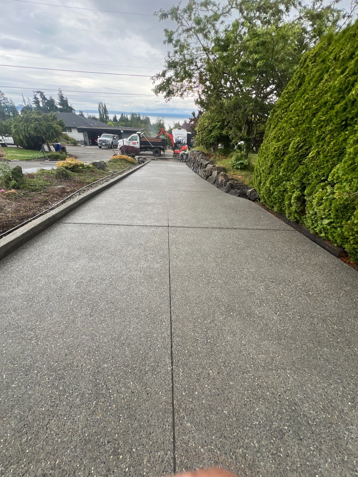 Concrete Driveway Makeover w/ Asphalt Patch | Everett  by Jireh Asphalt & Concrete Inc 