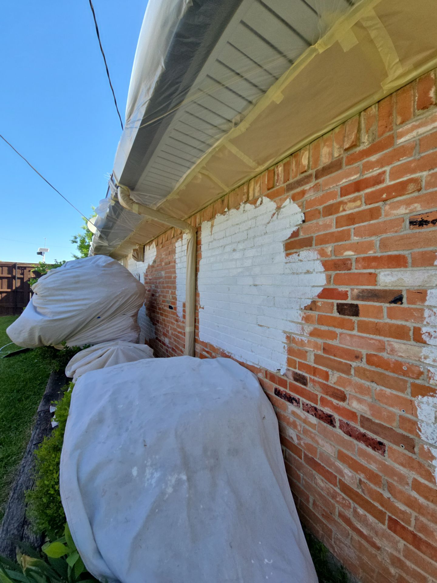 Exterior Home Paint Project with Different Surfaces by SLM General Contractors & Roofing