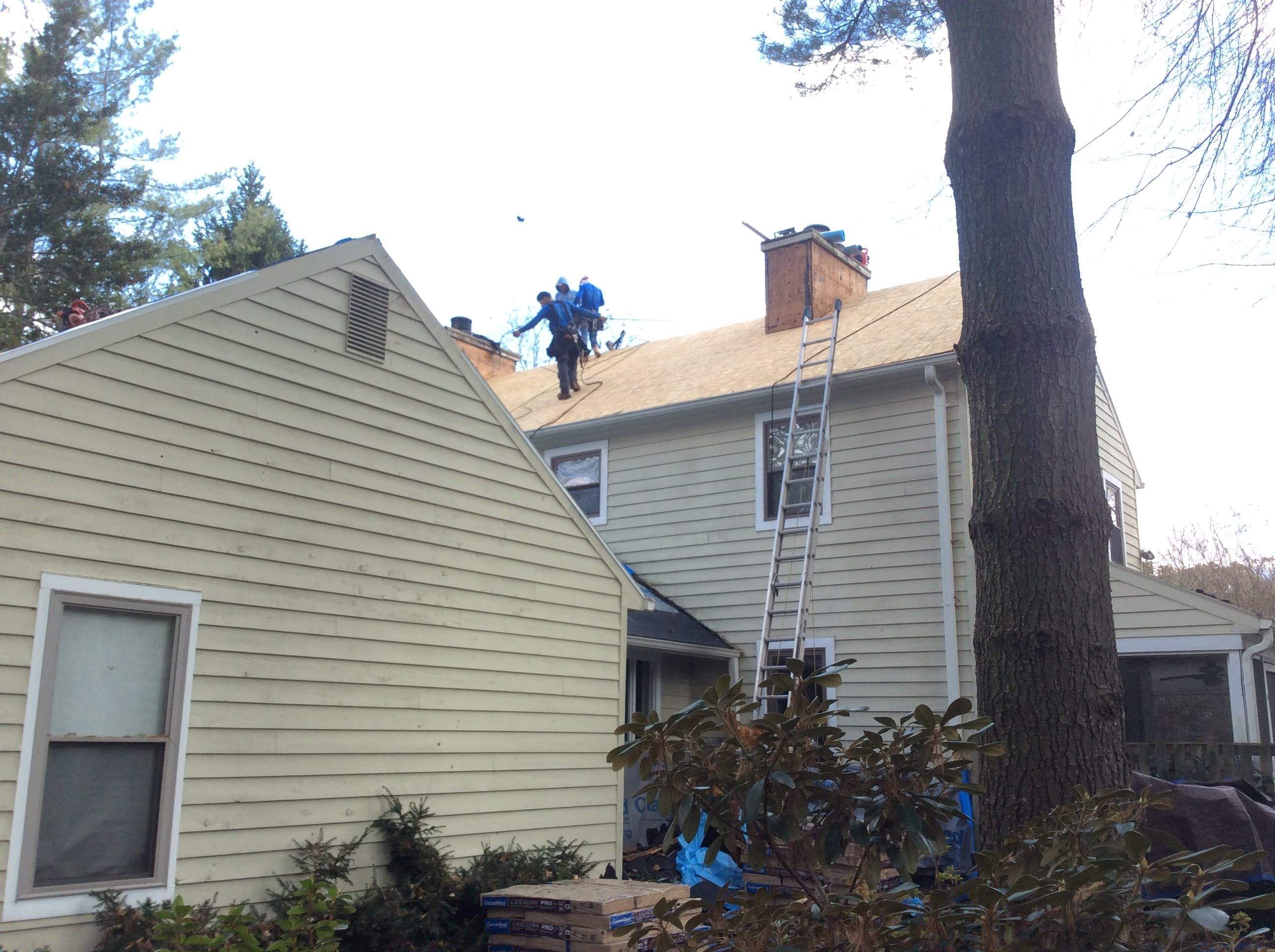 Residential Roofing Installation using Pewterwood Shingles  by Alpha Design Services