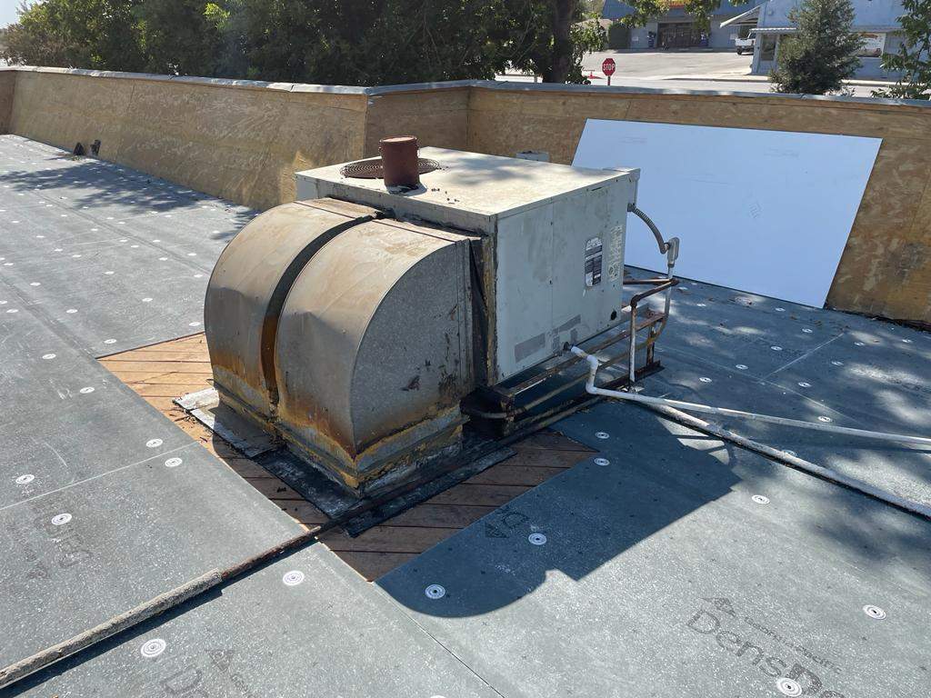 Commercial Roofing Installation using General Coatings acrylic coatings and spray foam by Straight Edge Roofing Inc