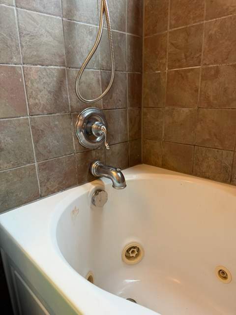 Jetted Bathtub & Custom Tile Bathroom Remodel by Laser Focused Solutions LLC