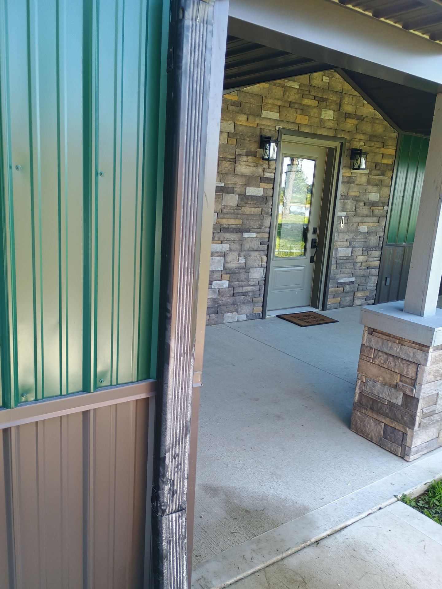 Siding Installation using Platinum AG Panel Burnished Slate  by Nitro Roofing and Construction