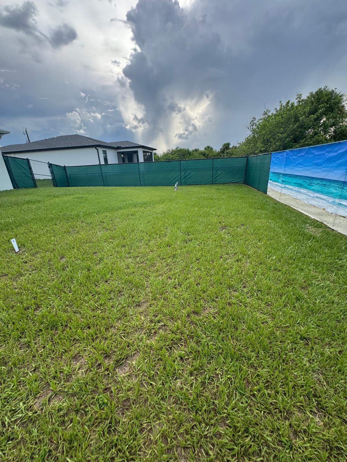 Chain Link Fence Installation with Custom Beach Privacy Screen in Port Charlotte by True Fence LLC