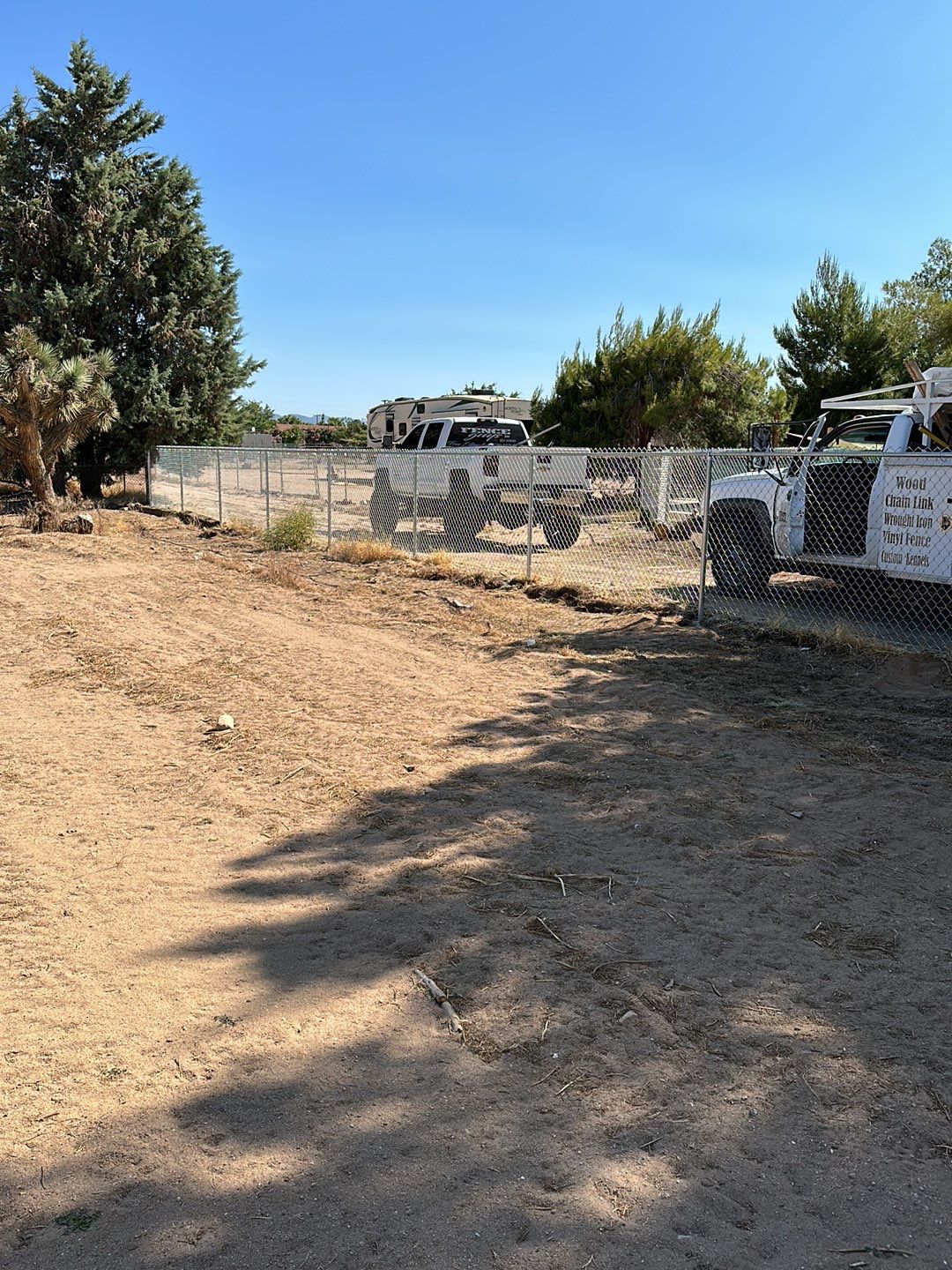 Replaced wood fence with chain link fence.  by Fence Guys Inc. 