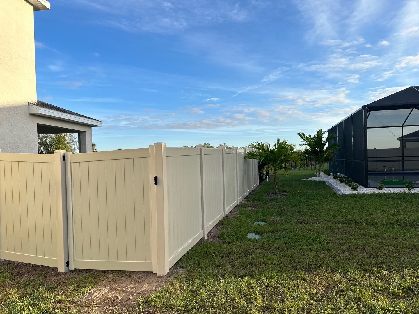 Vinyl Fence Installation using Vinyl Fence and a Black 3 Rail Aluminum Fence by Asap fence and gates, LLC