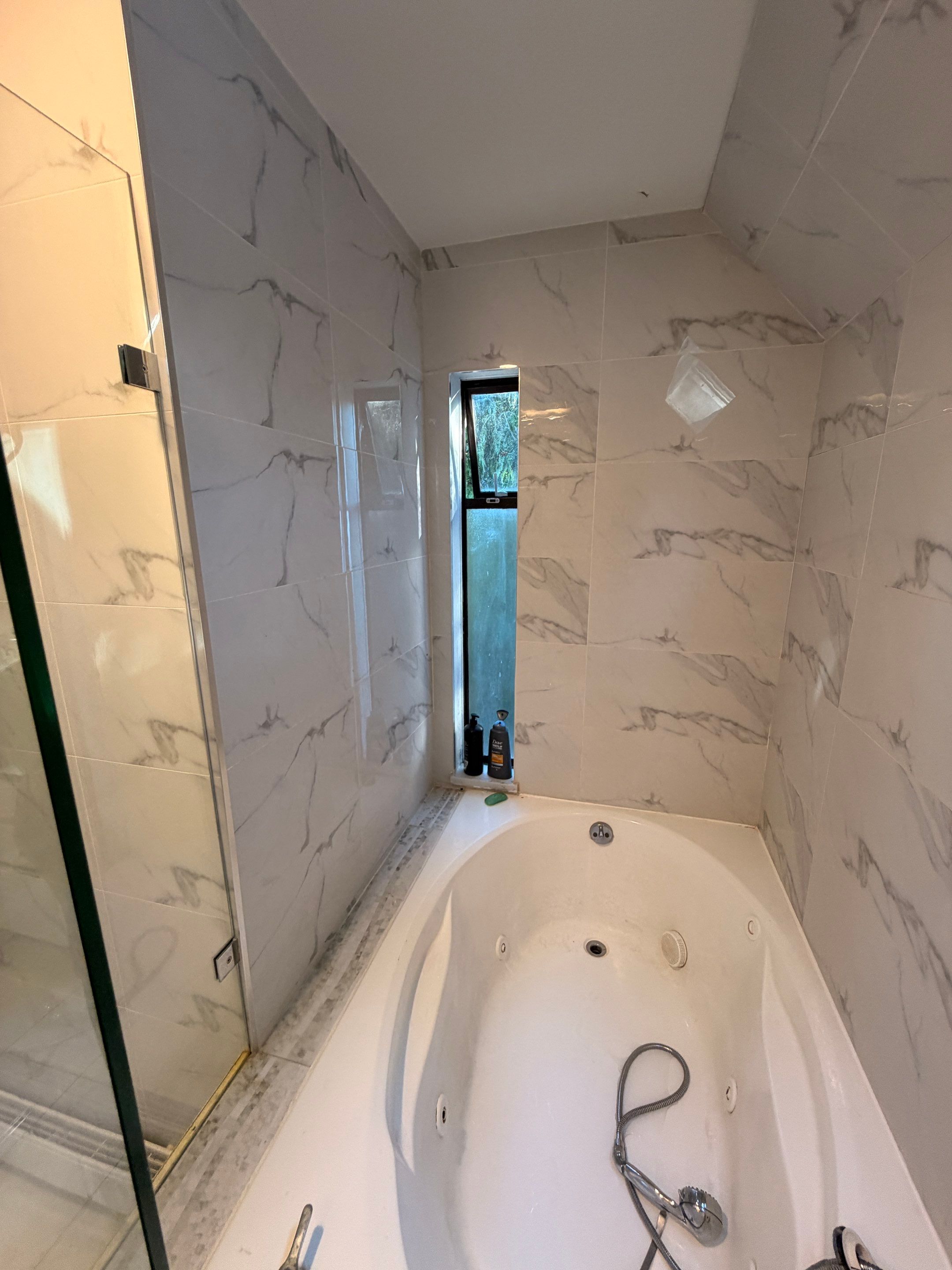 Water Damage Restoration & Bathroom Renovation in West Vancouver by YVR Construction Group