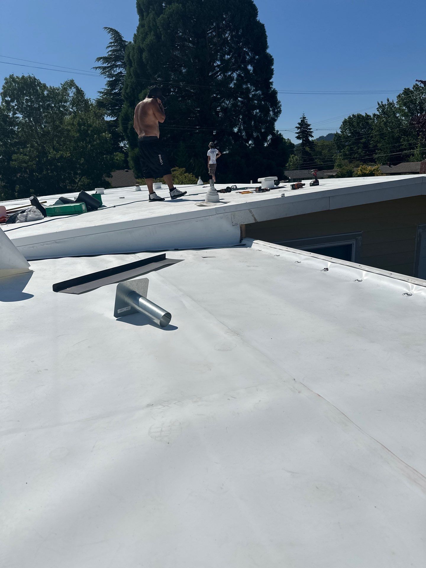 Residential Flat Roof Installation using GAF 60Mil TPO  by Orezona Building & Roofing Company, Inc.