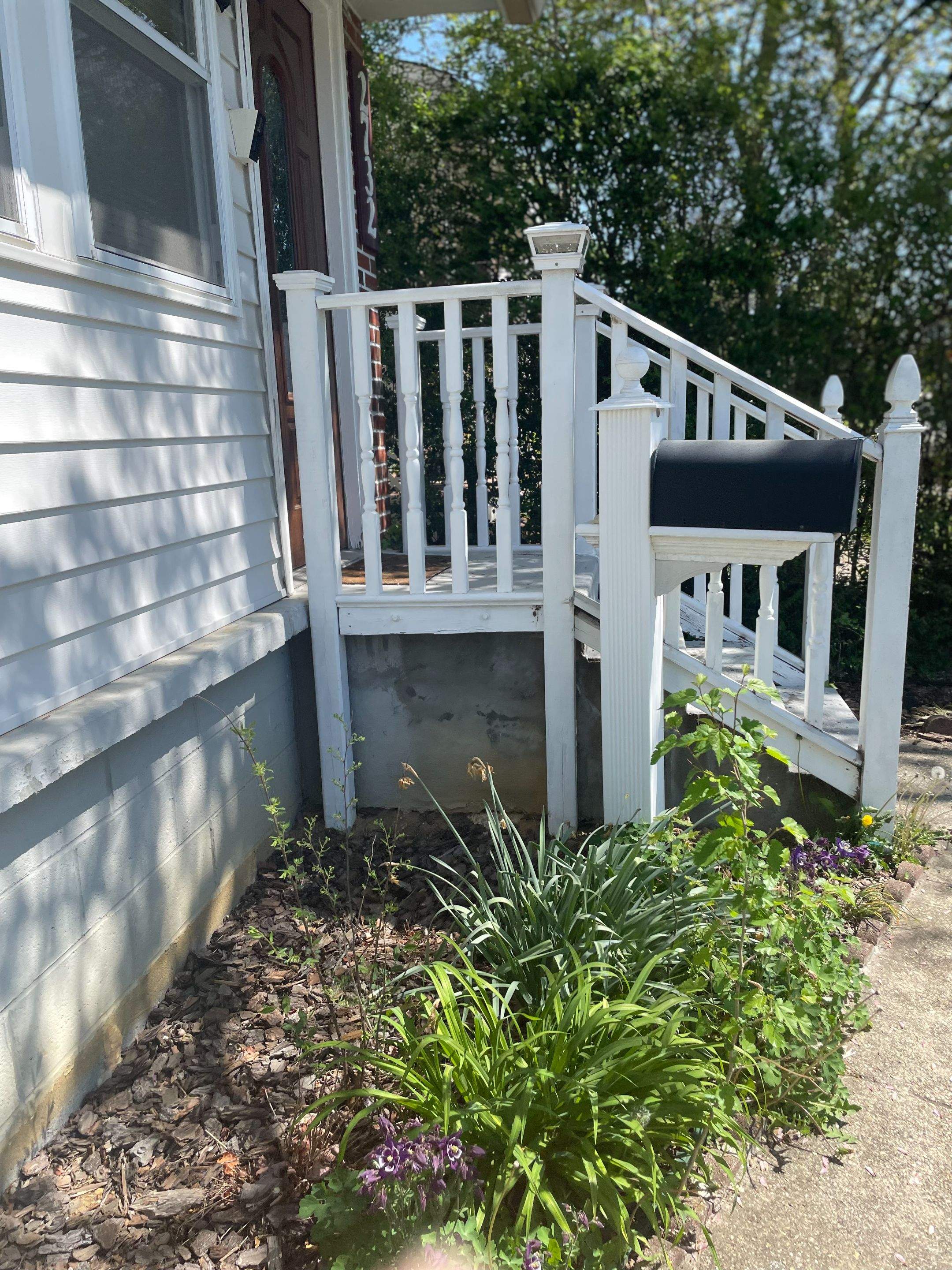 Deck resurfacing, railing replacement and concrete resurfacing by Fairfax Contractors, LLC