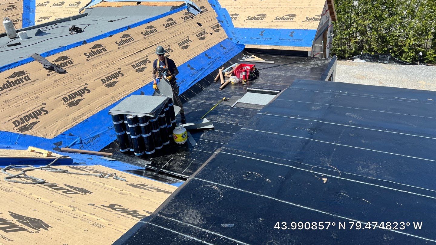 Custom Home Jet Black 24 GA Standing Seam Roof  by Jay Carter Roofing & Sheet Metal