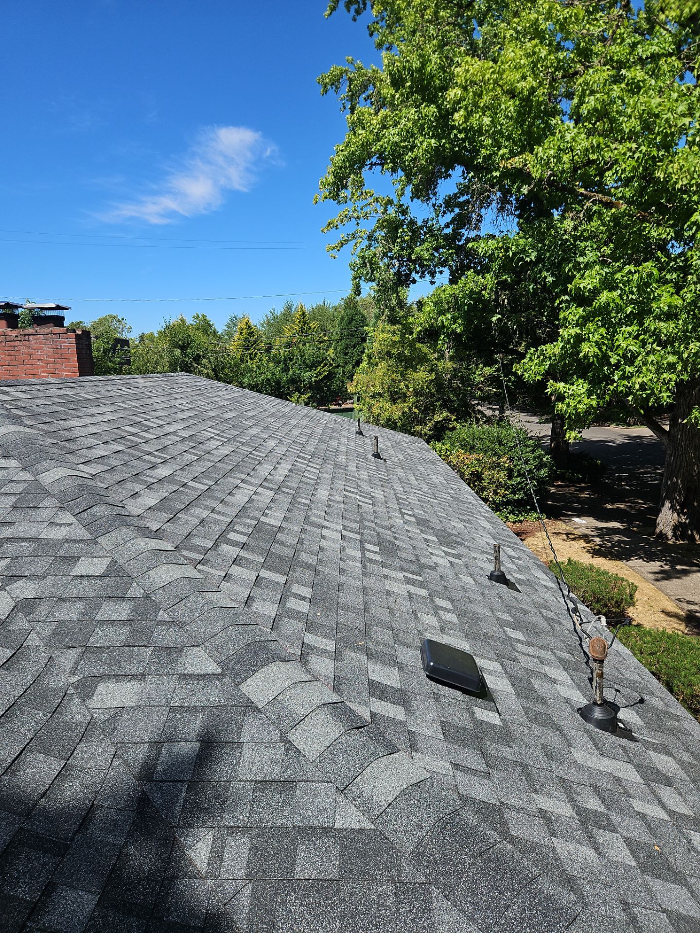 Residential Roofing Installation using IKO Dynasty (Color: Summit Grey) by Orezona Building & Roofing Company, Inc.