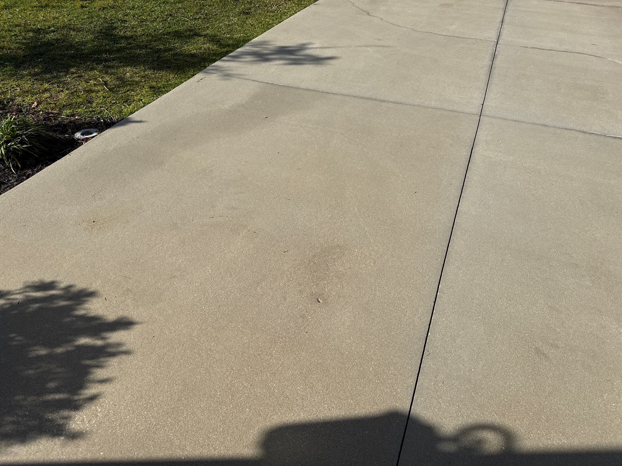 Oil Stain Removal & Concrete Cleaning – The Heights Community, Bradenton, FL by Sunshine AquaWash