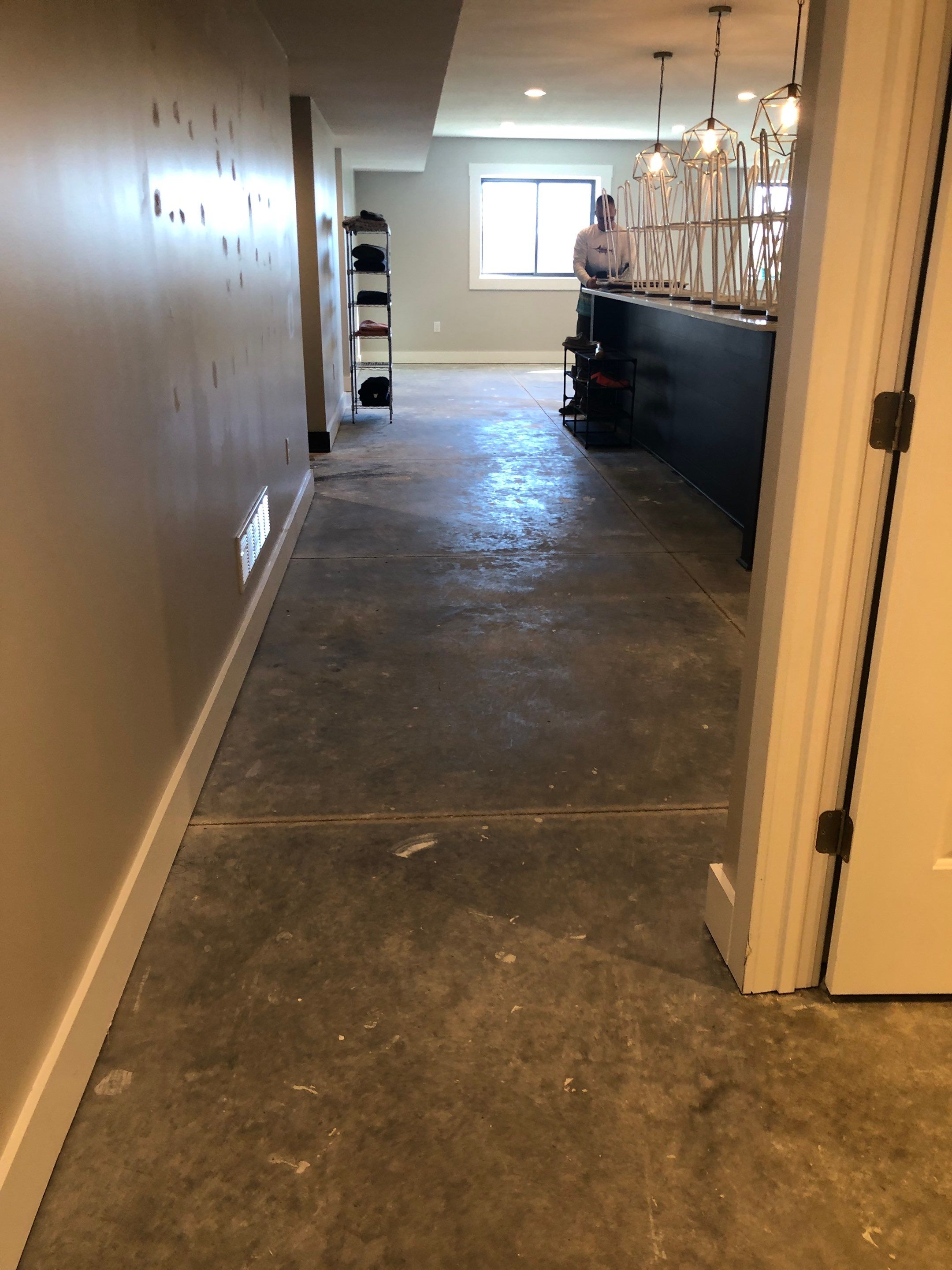 Louisburg, KS -- Basement Polish using Grey Stain by Big Red Decorative Concrete, LLC