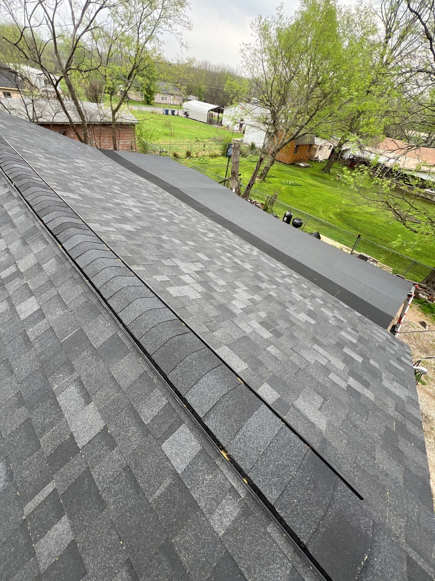 New Roof & Decking Brought to Code. by In & Out Construction & Remodeling, LLC