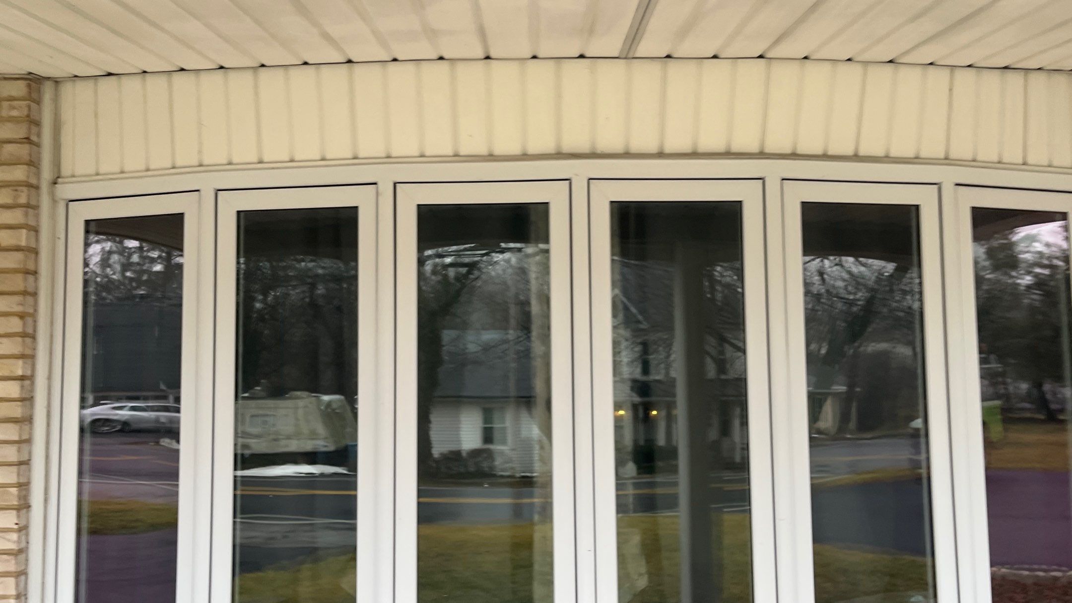 Double Hund Windows and Bow by Aspen Home Improvements