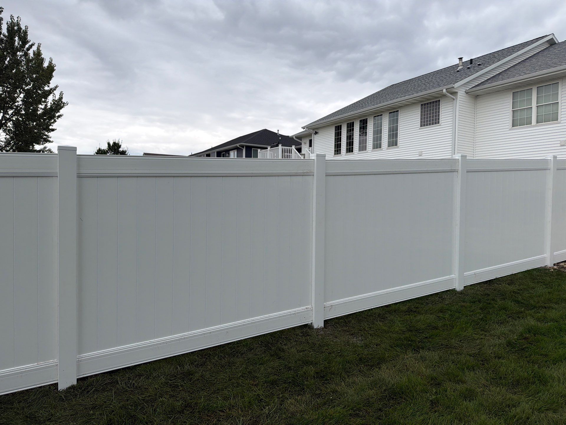 Residential Vinyl Privacy Fence Installation in Urbana by Perfect Picket Fence and Stain