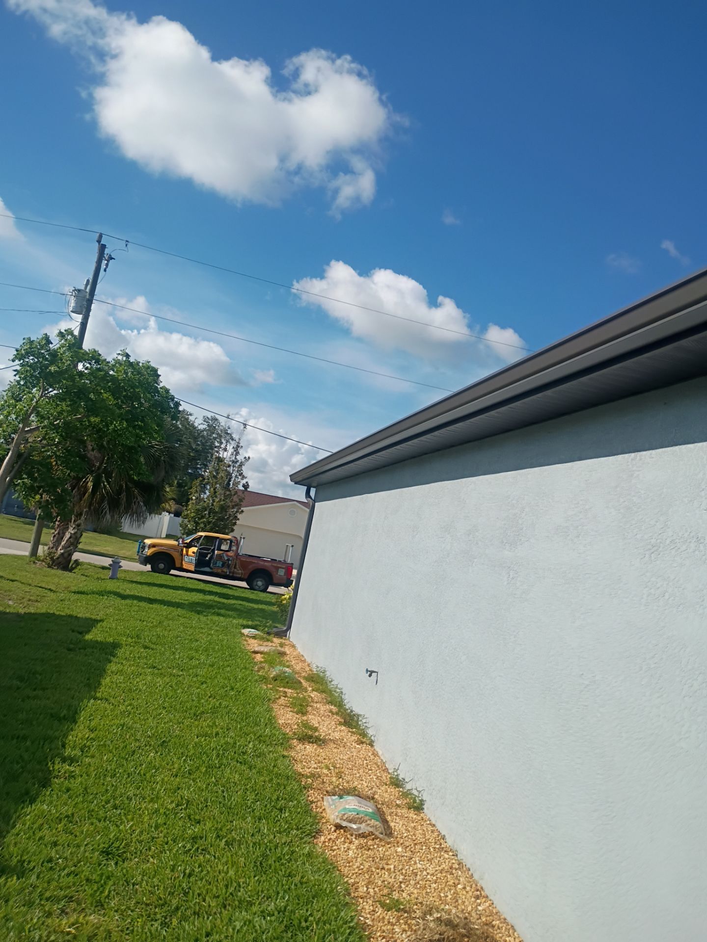 Dark Bronze Seamless Gutters using 6 Inch Seamless Gutters in Cape Coral FL by Gutter Professors