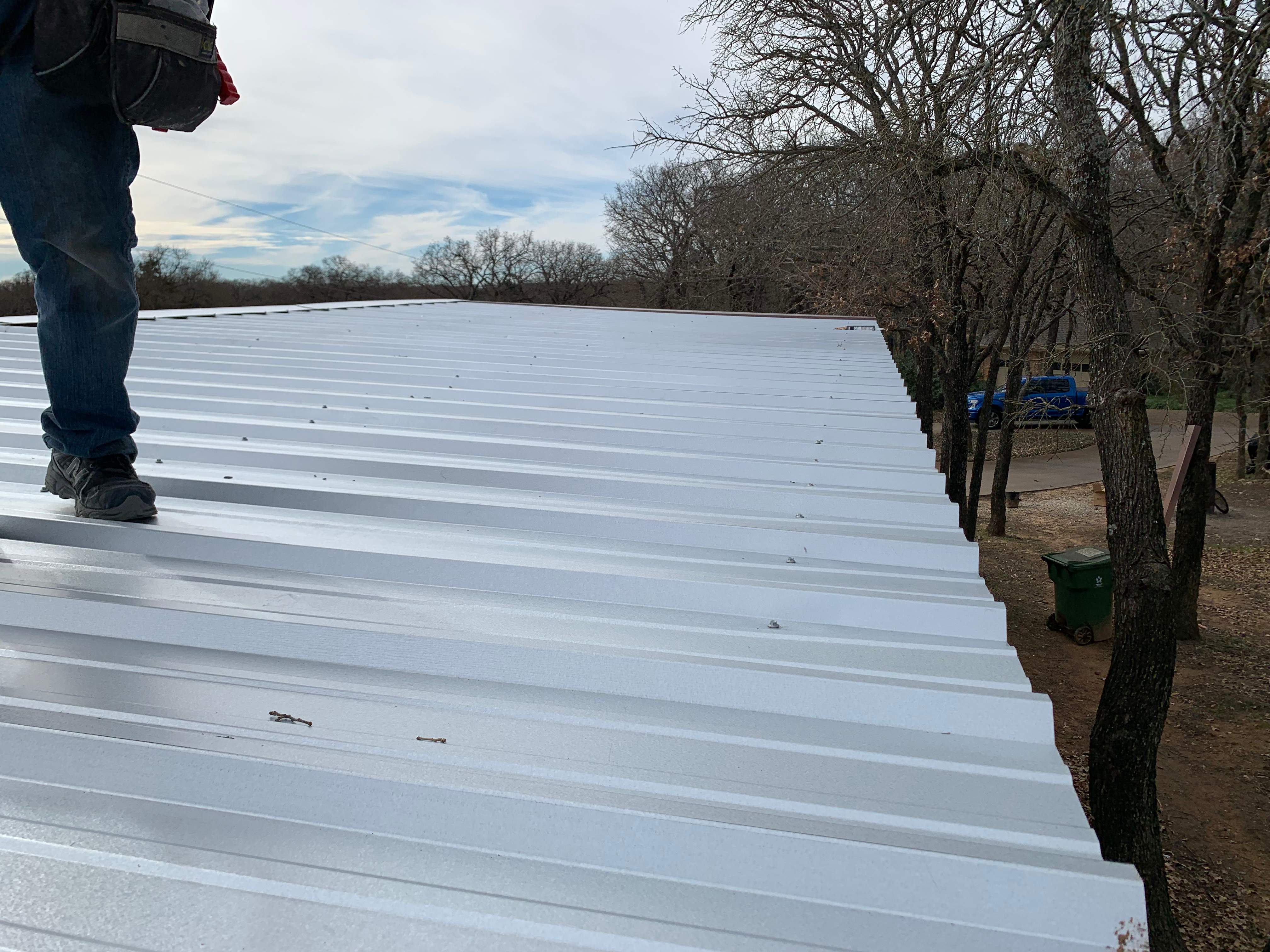 Install new R Panel Metal Roof at a Clients Farm house by First United Roofing & Construction