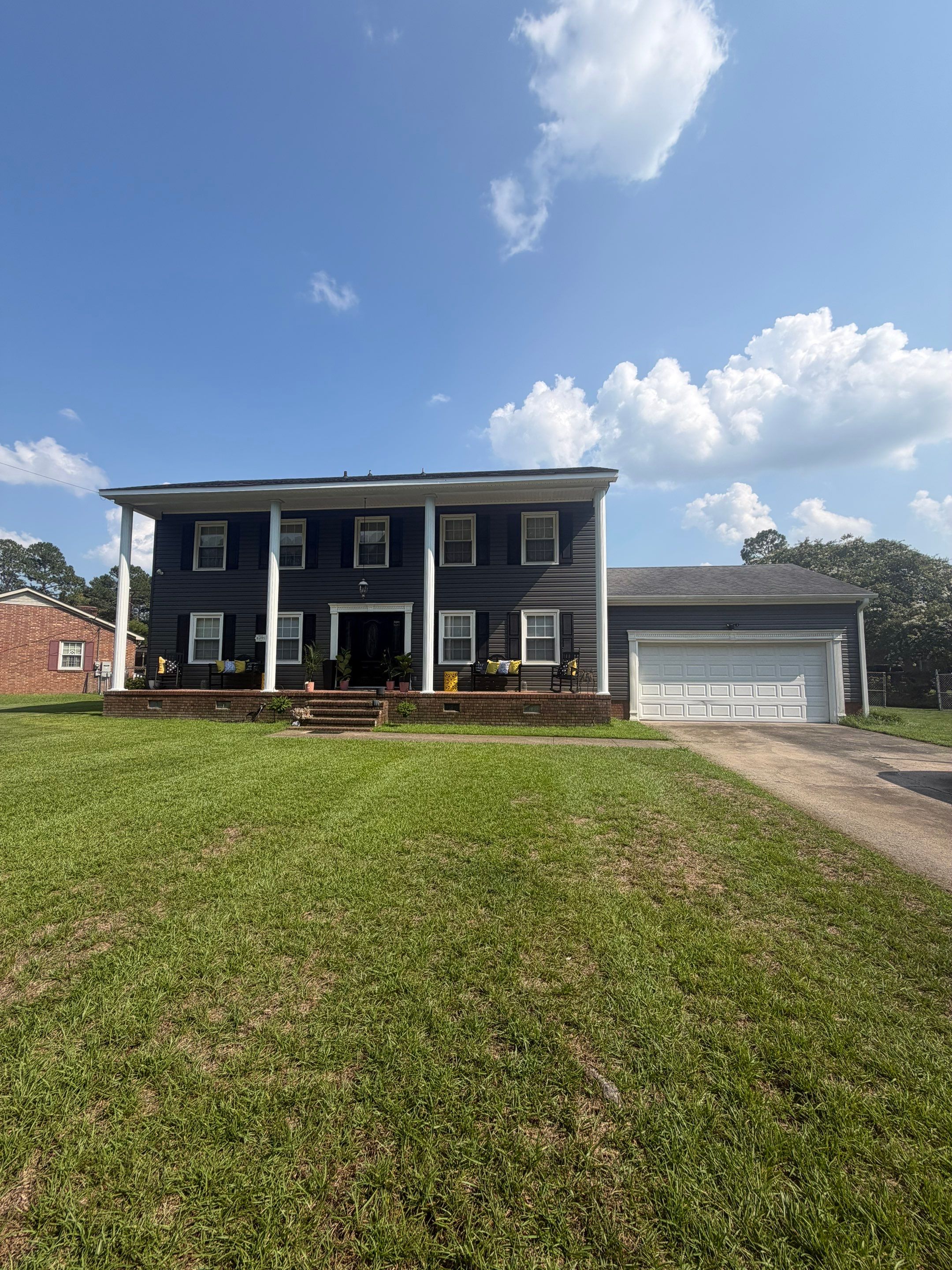 Dark Gray Siding and Custom Deck Installation in Kinston by The Remodeling Company
