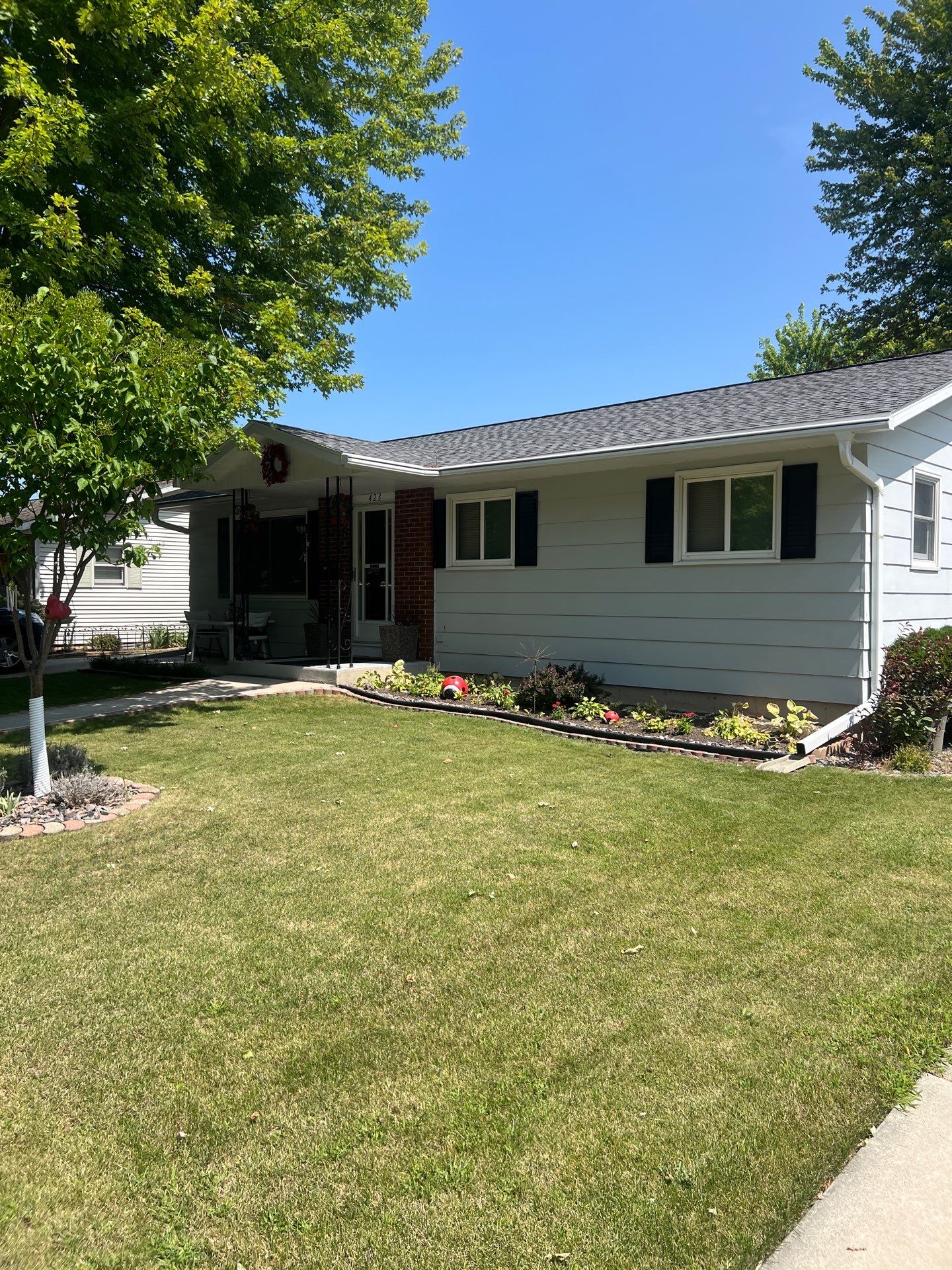 Siding Replacement with Vinyl Siding in Granite Gray by Gellings Roofing & Siding
