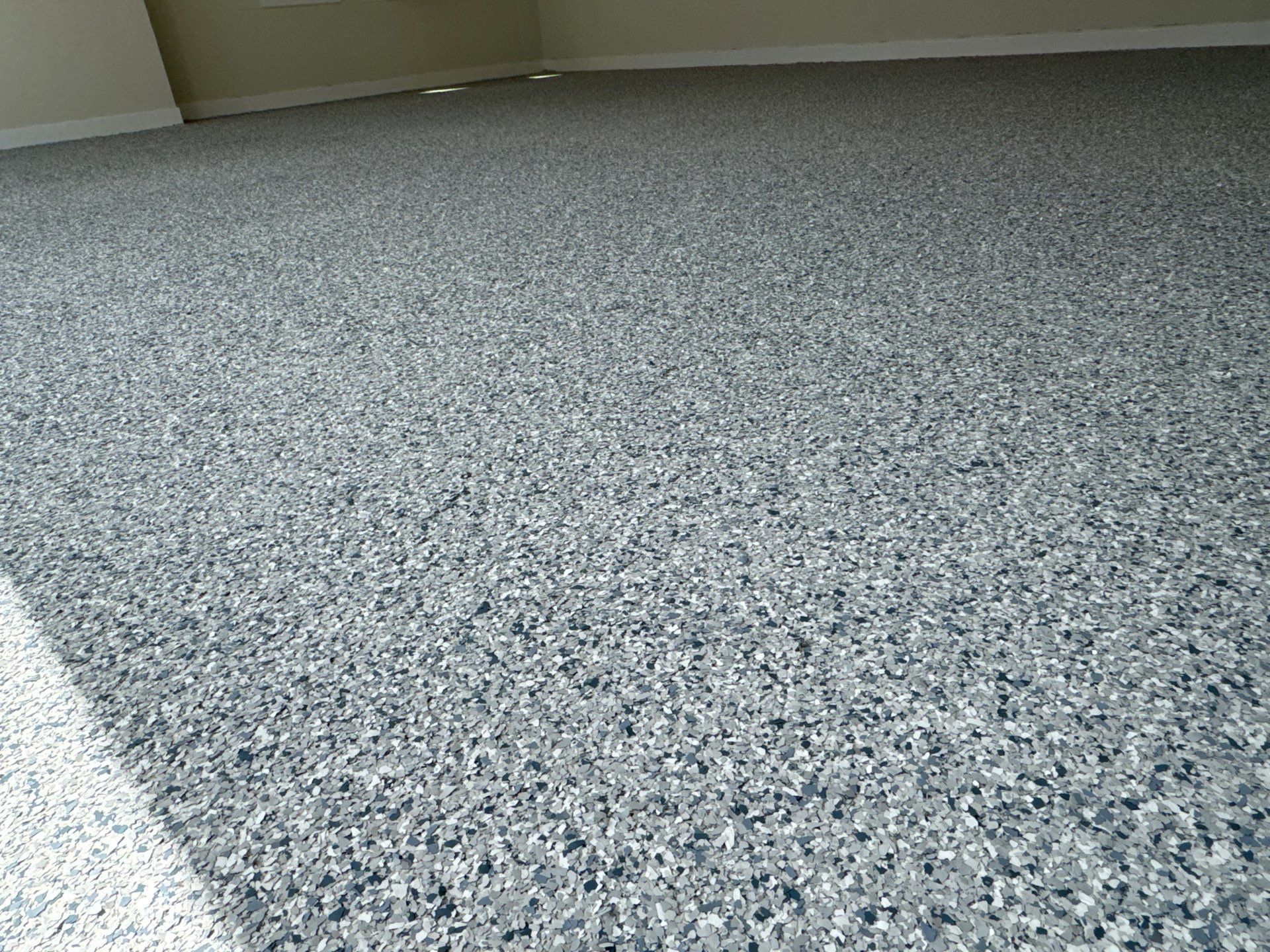 Garage in Tidal Wave by Cross Creek Concrete Coatings