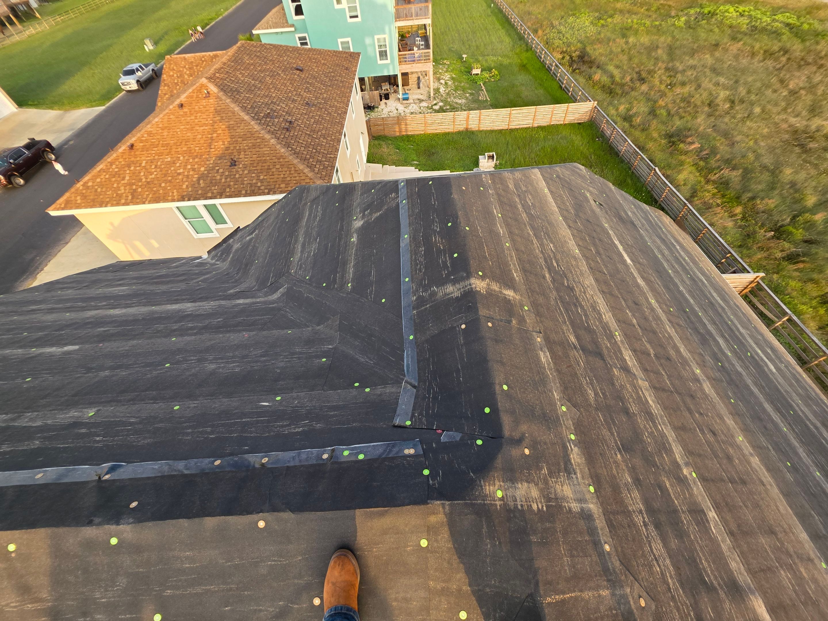 We Aint Scared of heights  by Bayfront Roofing and Construction