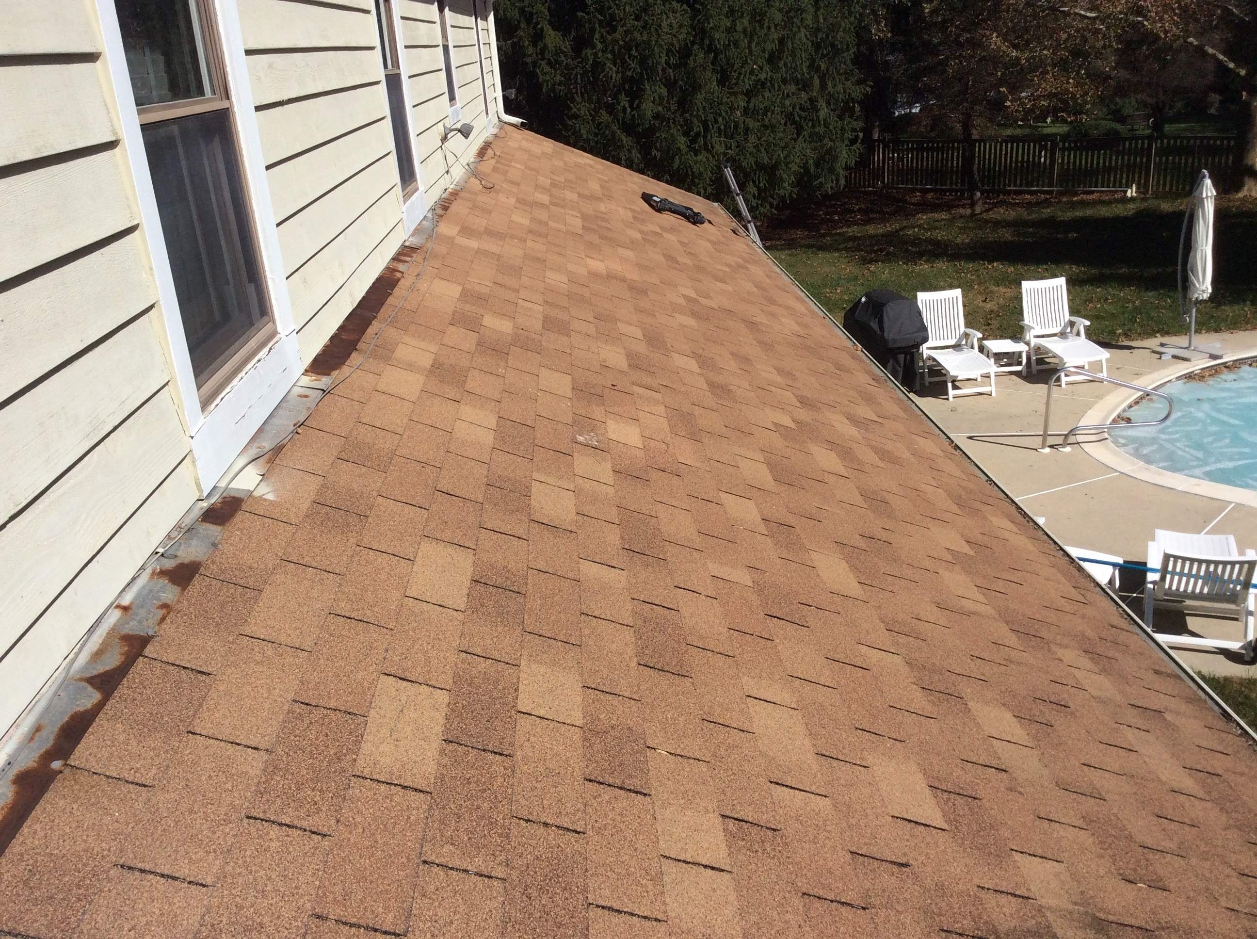 Residential Roofing Installation using Pewterwood Shingles  by Alpha Design Services