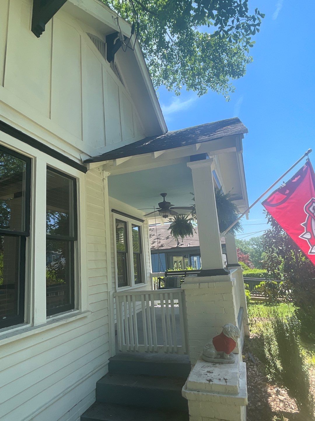roof replacement and new black gutters by Nailed It Roofing & Remodeling LLC