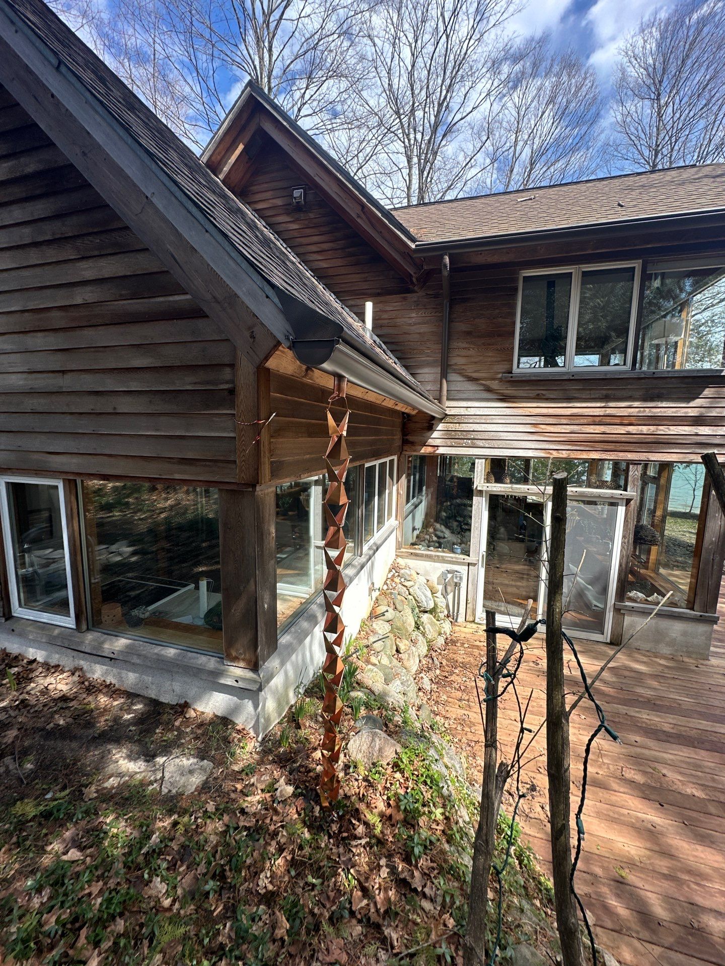 Gutter, Gutter Helmet and Copper Rain Chain Installation in Suttons Bay by Rainbow Seamless Systems