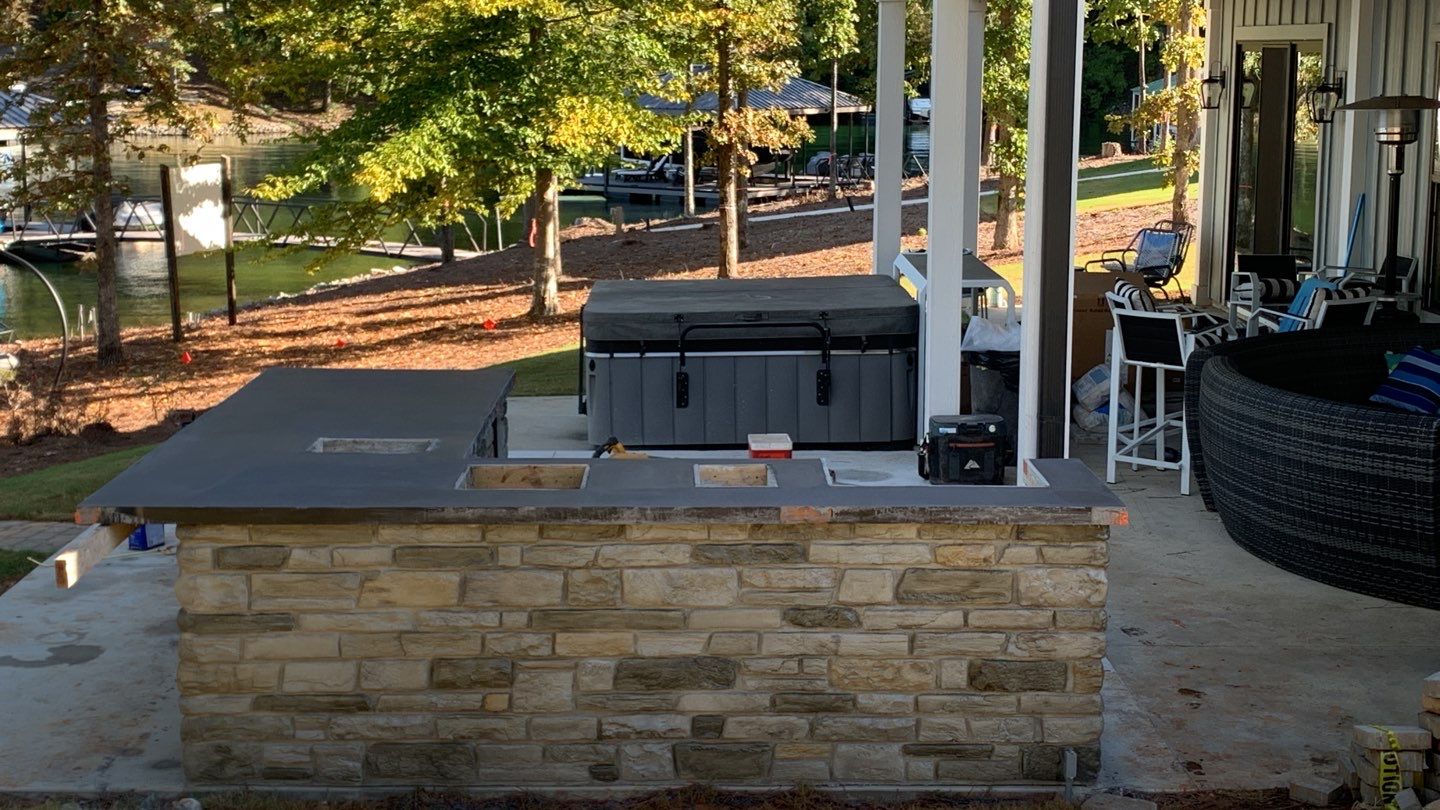 Outdoor Kitchen on Lake Keowee by Xtreme Concrete Services