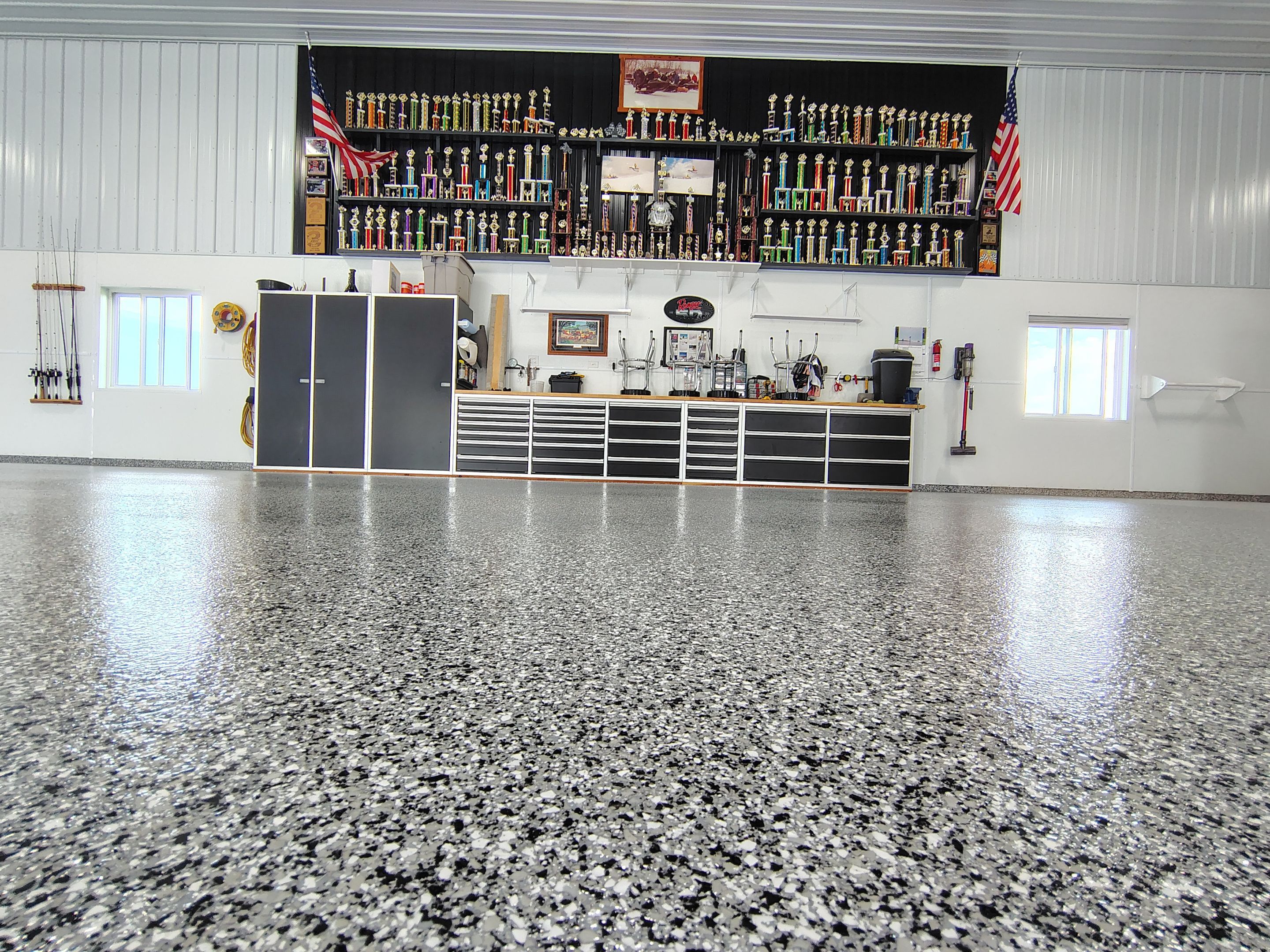 Multi-Stage Concrete Floor Coating for Egan Shop and RV Storage by Select Painting, Coatings & Garage Cabinets