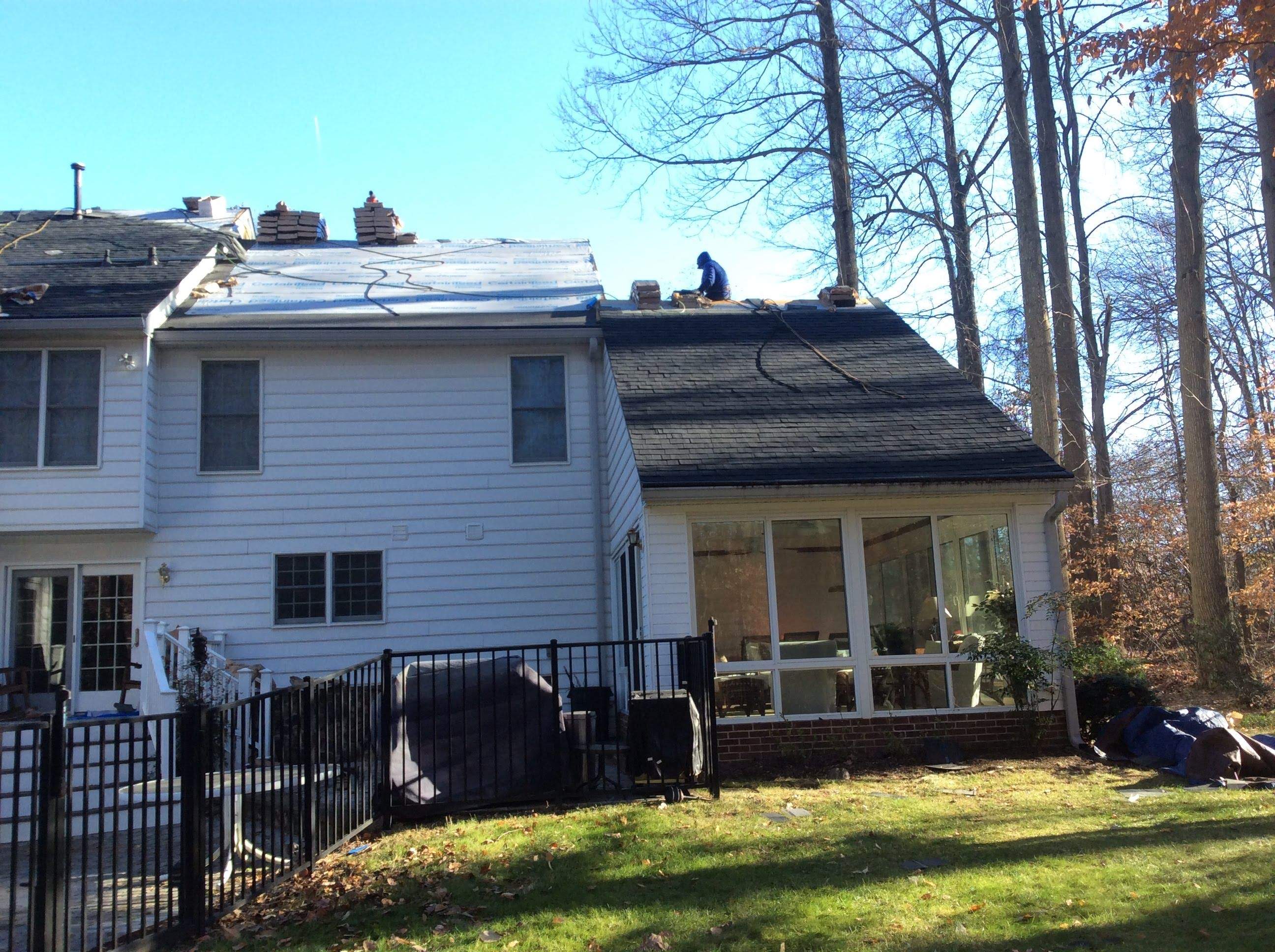 Residential Roofing Installation using Charcoal Black by Alpha Design Services