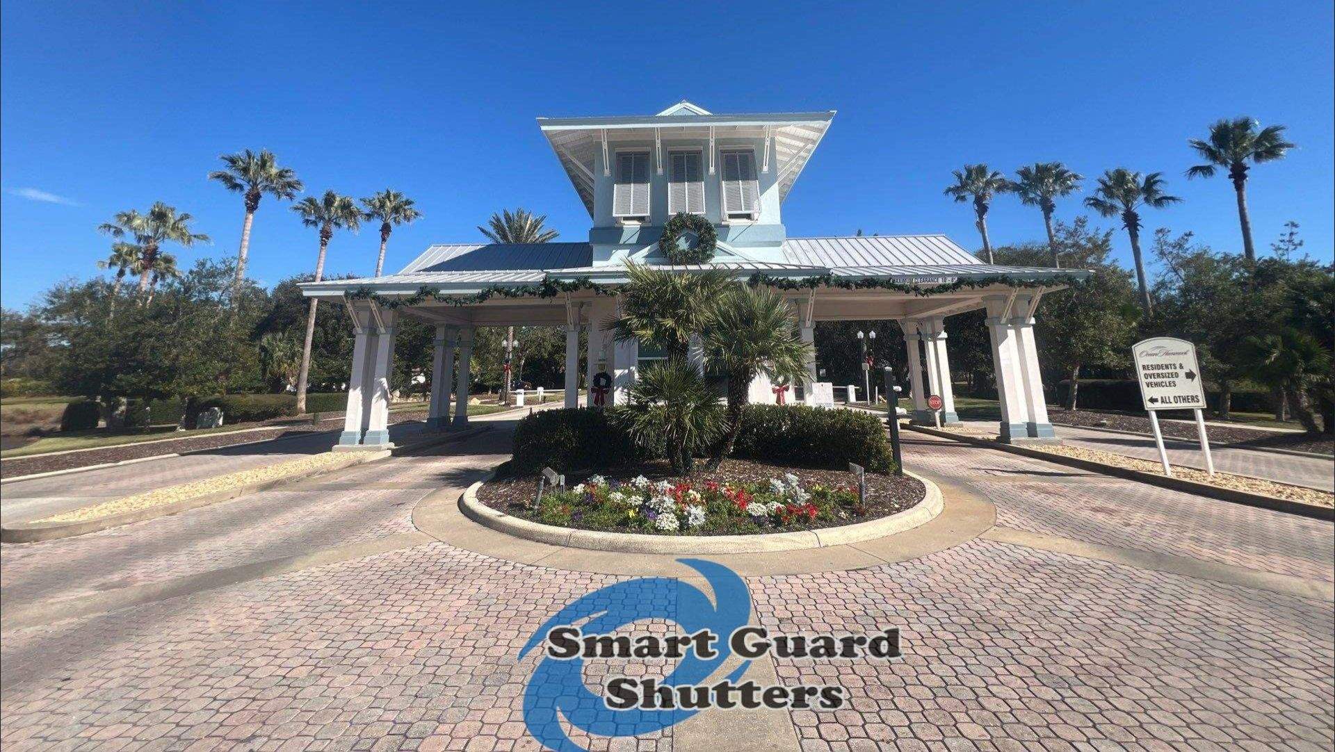 Decorative Bahama Shutters in Window Grey by Smart Guard Shutters