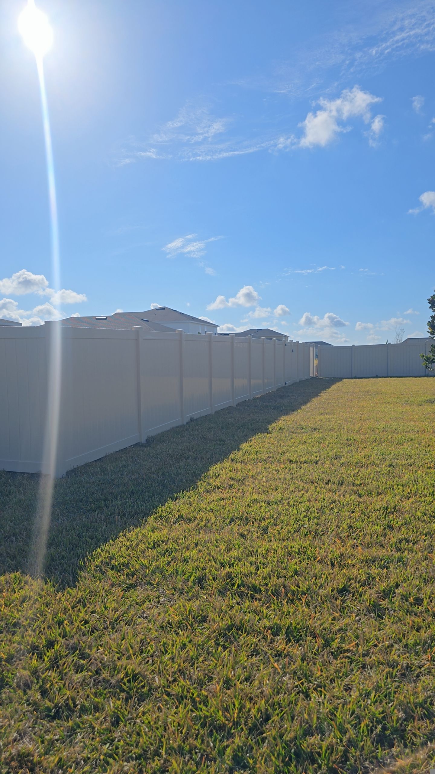 Tan Vinyl Fence in West Port by True Fence LLC