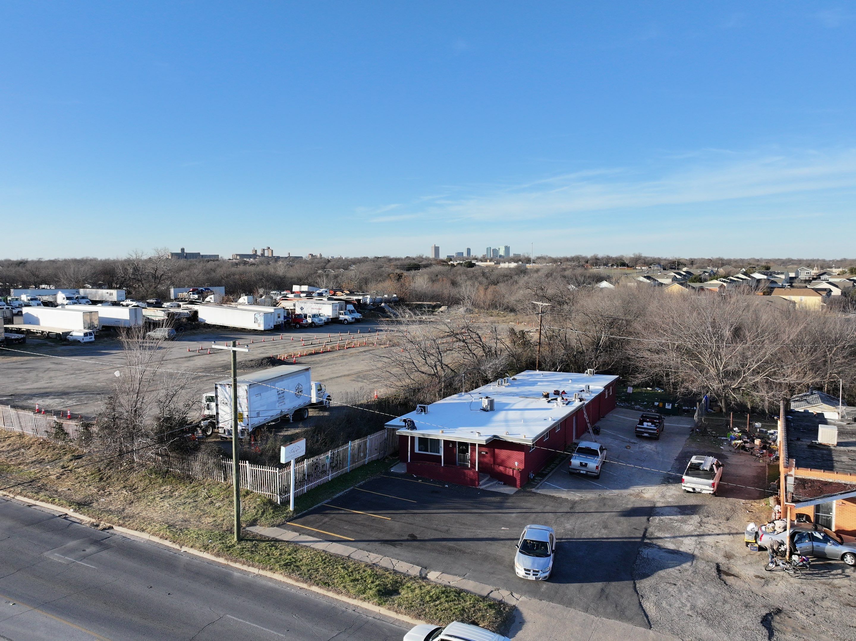 Commercial roofing overlay using GAF TPO over an old ballast roof by Becker Roofing and Exteriors