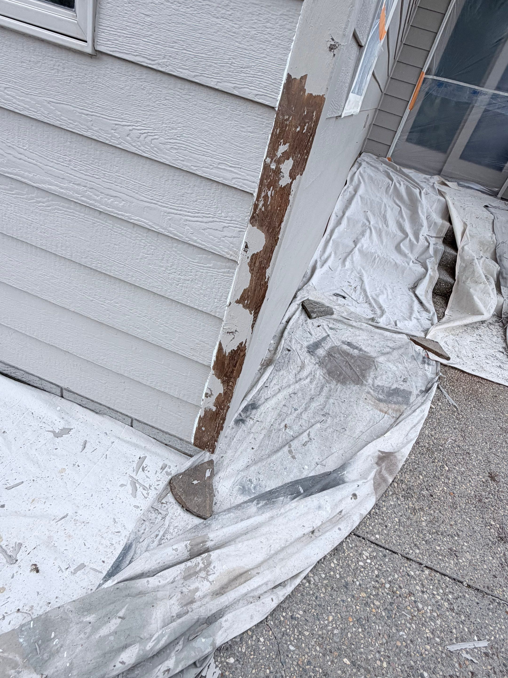 Exterior Siding and Trim Painting for Sioux Falls Residence by Select Painting, Coatings & Garage Cabinets