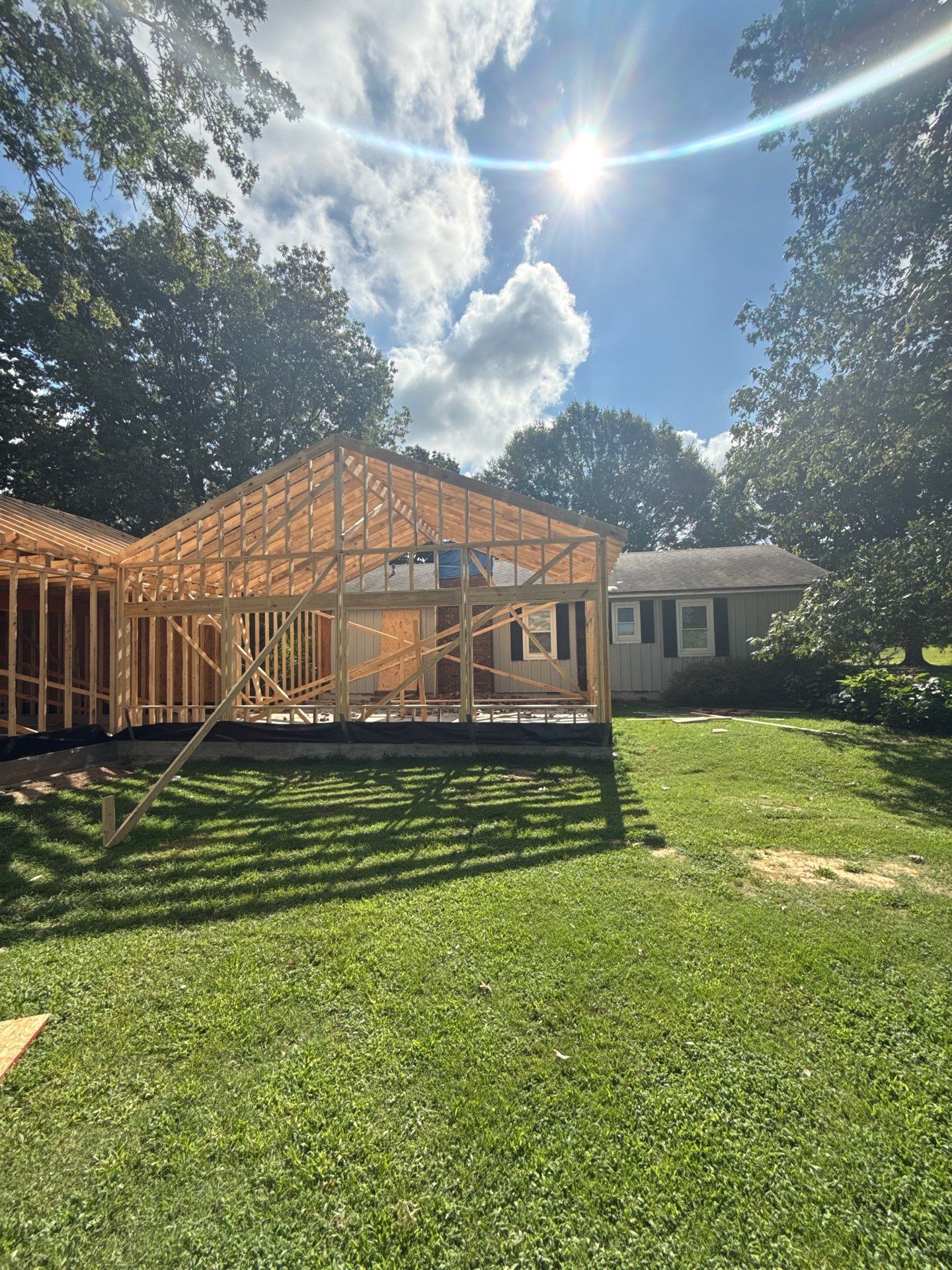 Sunroom and Garage Addition by Skilled Construction LLC