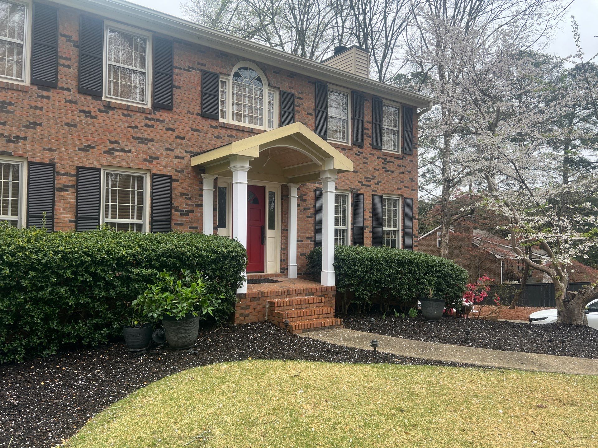 Exterior Entryway and Trim Renovation for Smyrna Brick Colonial by Swift Home Renovations