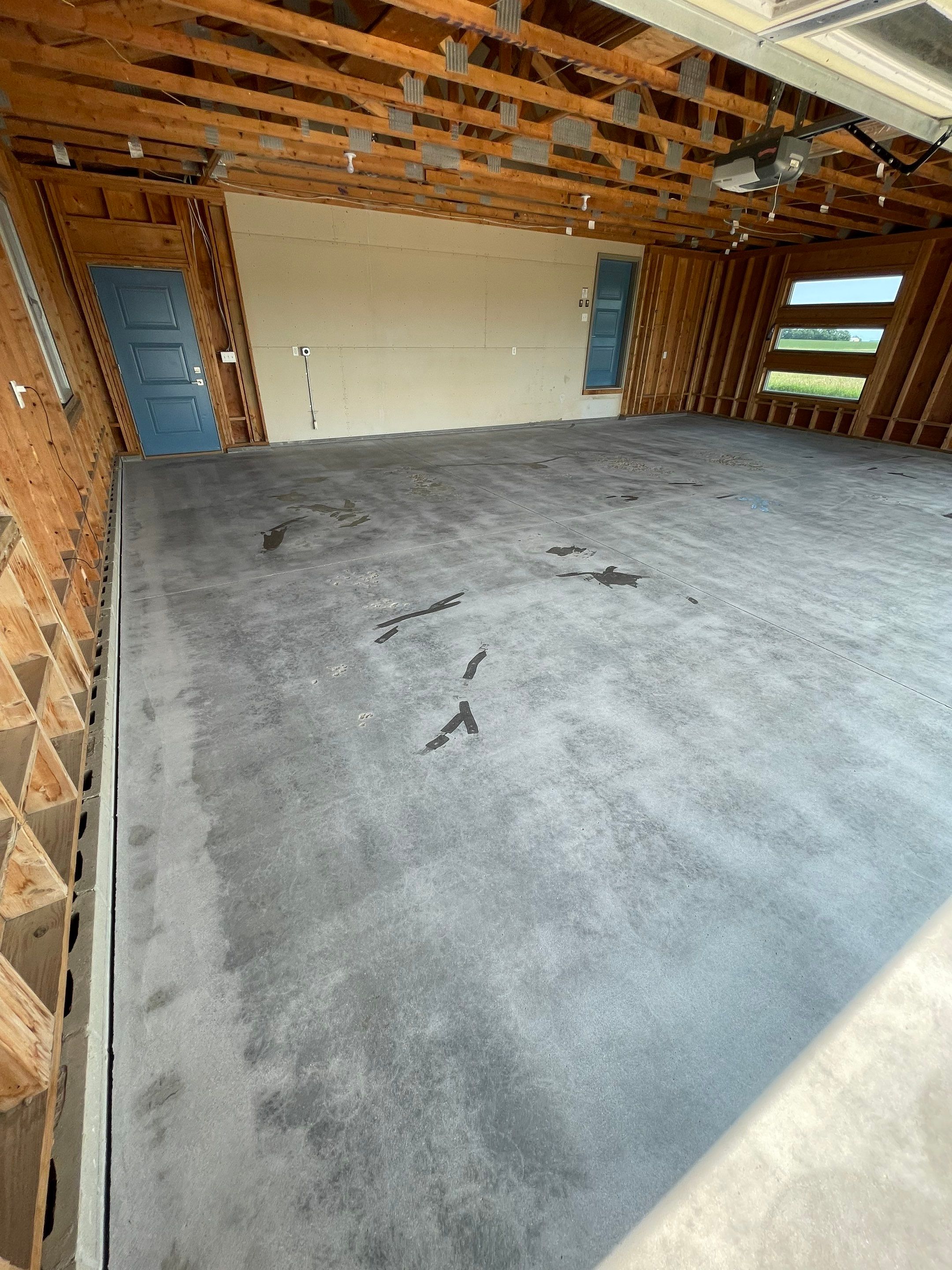 Cabin Fever Coating for Detached Garage in Dell Rapids by Select Painting, Coatings & Garage Cabinets