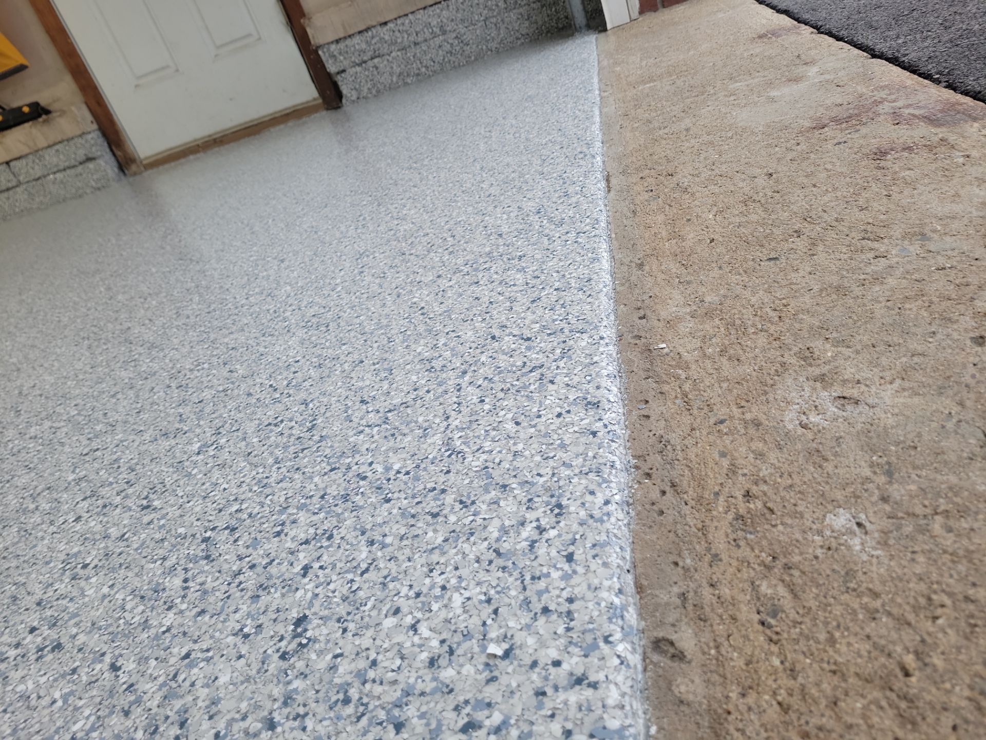 Garage Floor Coated by Spectrum Painting, LLC
