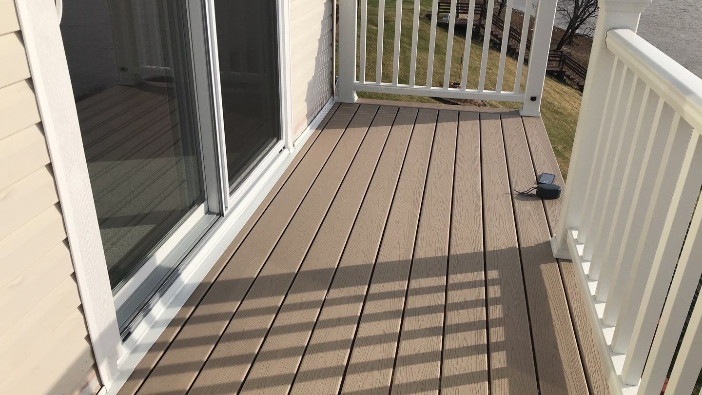 Deck Refurbush and Door Replacement using Trex Decking and Railing.  Polaris Patio Doors by Secure Construction Company Inc