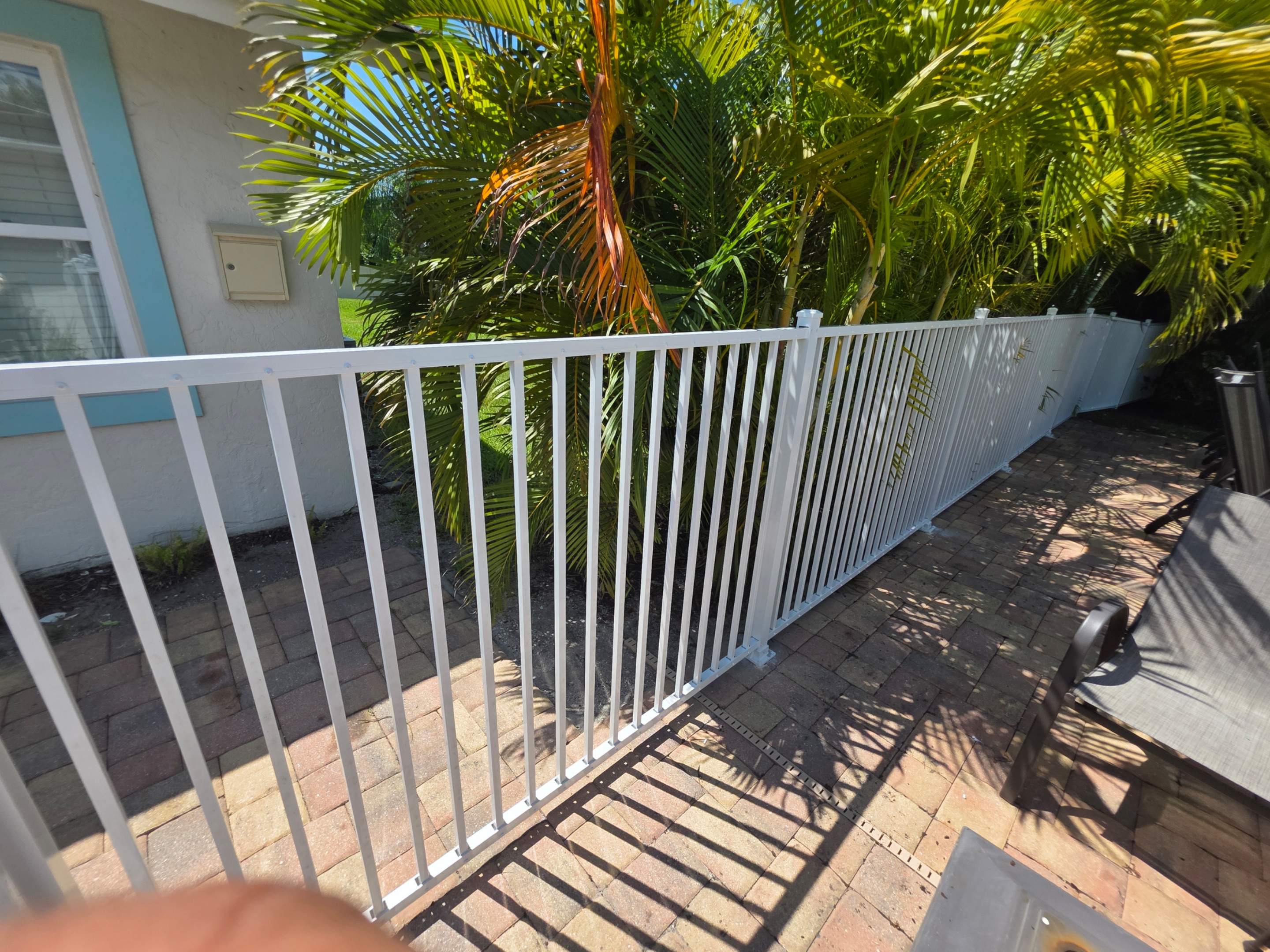 Commercial White Aluminum Pool Fence Installation in Naples by True Fence LLC