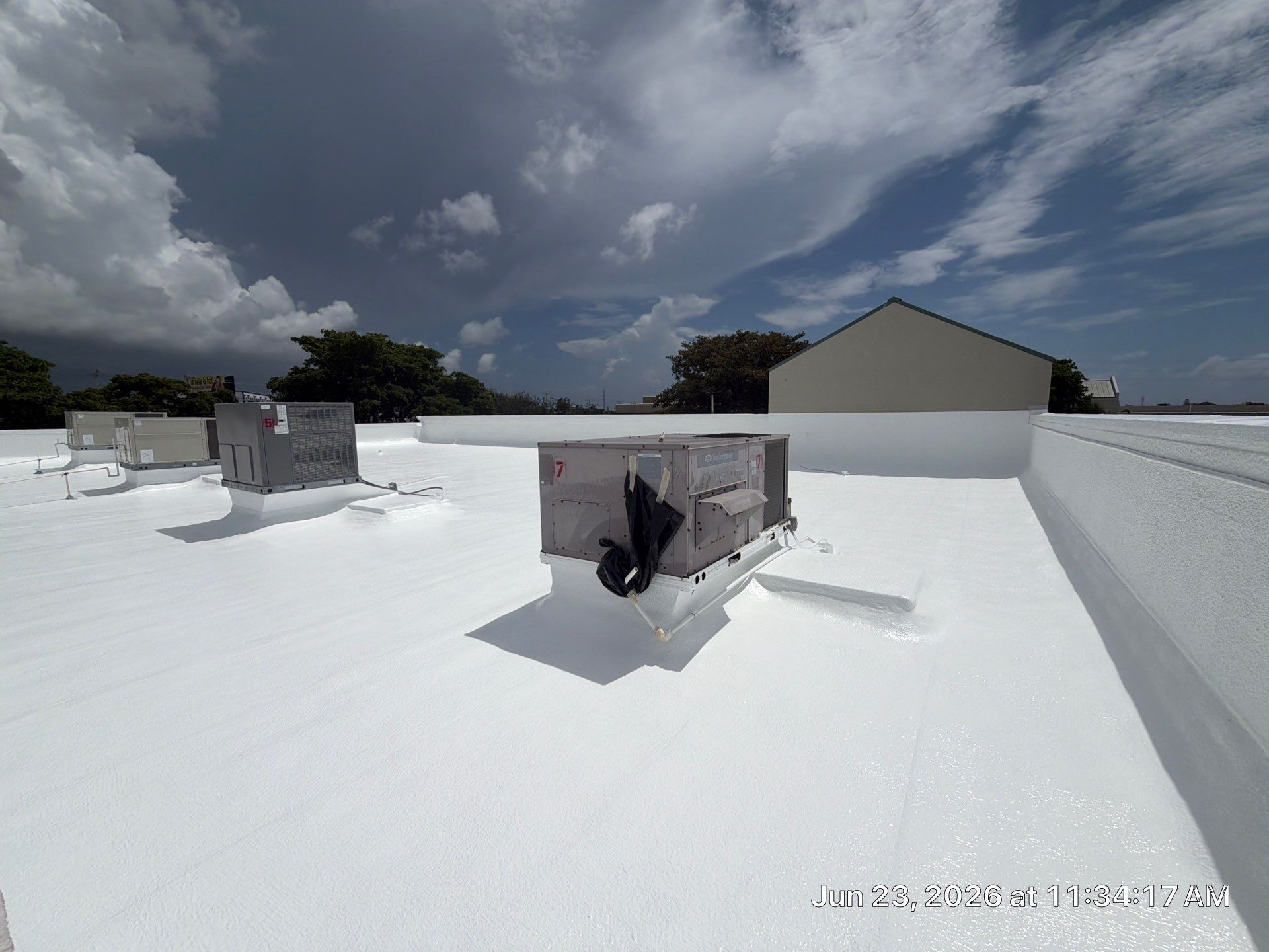 Commercial Flat Roof Restoration and Elastomeric Waterproofing in Delray Beach by Roof King LLC