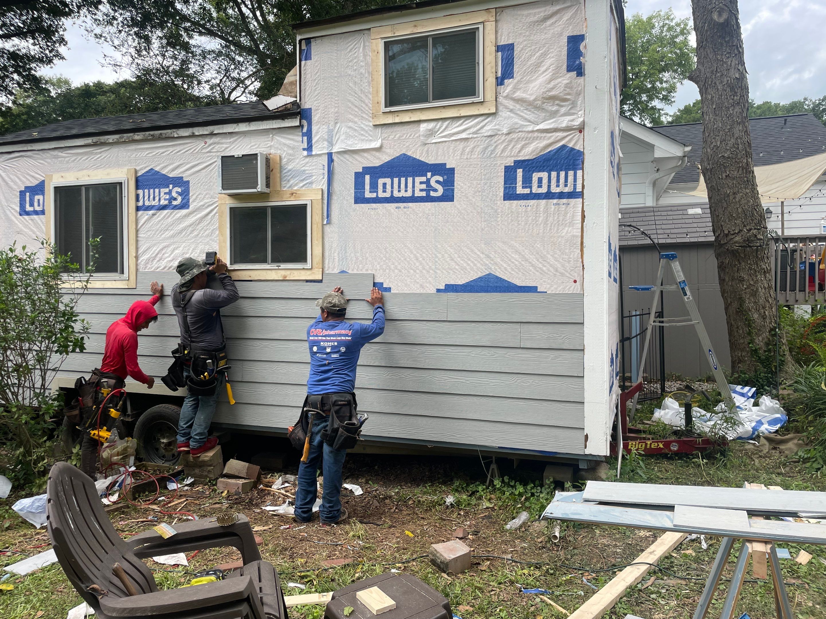 tiny home remodel- siding,paint,roofing by Nailed It Roofing & Remodeling LLC