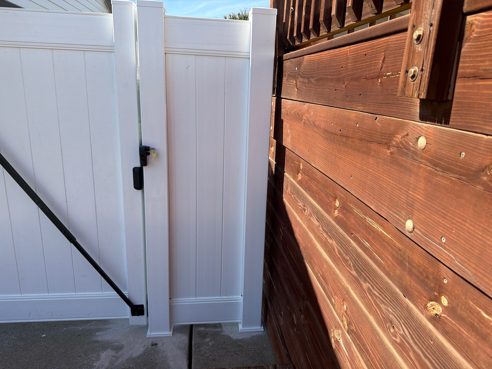 Custom Vinyl Privacy and Chain Link Fence Installation in Waterloo by Perfect Picket Fence and Stain
