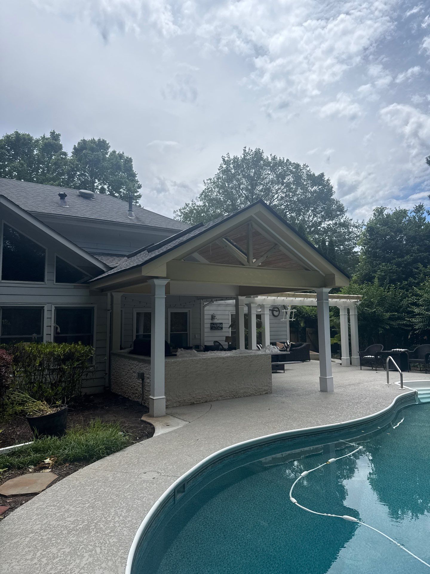 Marietta Poolside Pavilion with Custom Outdoor Kitchen and Pergola by Swift Home Renovations
