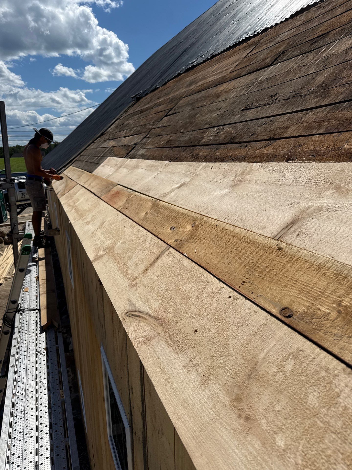 Barn Restoration and Board-and-Batten Siding Installation in Hansons Ridge by B's Roofing & Construction LLC